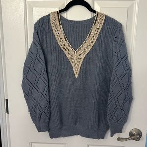 Light blue V neck Shein sweater with 2” beige lace trim.